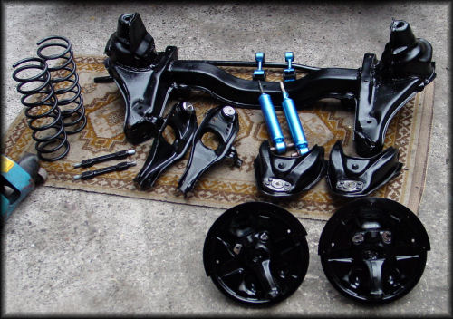 Restored Corvair crossmember and suspension components